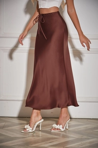 Detailed view of high waist coffee satin maxi skirt with drawstring belt and silk texture