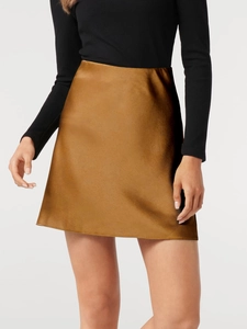 Detail view of the bronze satin mini skirt showcasing the silky fabric and metallic sheen