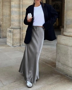 Outdoor street style shot of high-waist satin skirt with drawstring in silver grey