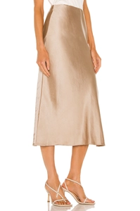 Detailed texture of champagne satin midi skirt with high-waist bias cut and silky finish