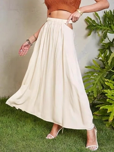 High-waisted cream white maxi skirt with side cutouts and elastic waistband design