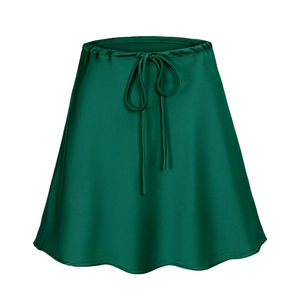 Detail of dark green satin skirt with elastic drawstring waist and bow knot detail