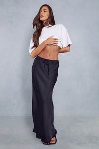 Detailed close-up of high-waist satin maxi skirt with drawstring waist design