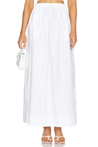 Detailed shot of white cotton maxi skirt with elastic drawstring waist and side slit detail
