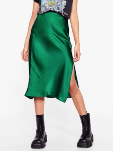 Elegant emerald green satin midi skirt with a side slit and high-waisted elastic fit