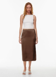 Detail of high waist satin midi skirt with side tie waist and smooth silk texture