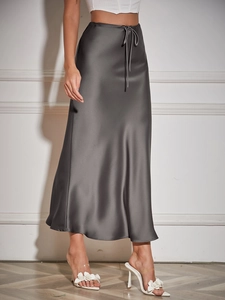 Elegant high-waisted dark grey satin maxi skirt with drawstring belt and silky finish