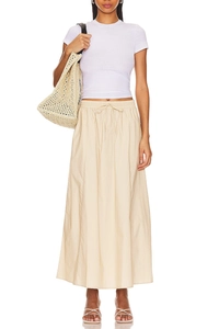 Detail of high waist slit maxi skirt with drawstring waist and functional side pockets
