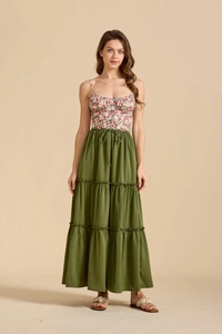 Detail of army green tiered maxi skirt with adjustable drawstring waist and layered ruffle