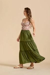 Detail view of high waisted olive green tiered maxi skirt with adjustable drawstring waist