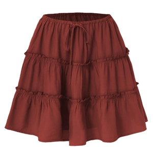 Close-up of dark red tiered ruffle skirt with elastic waist and adjustable drawstring tie