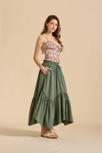 Detail of high waist adjustable drawstring on olive green maxi skirt with tiered ruffle hem