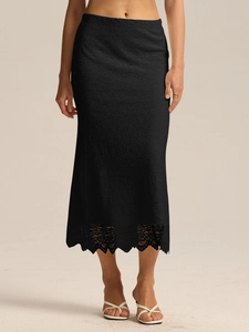 Jupe midi élégante en dentelle noire à taille haute avec texture florale et ourlet festonné