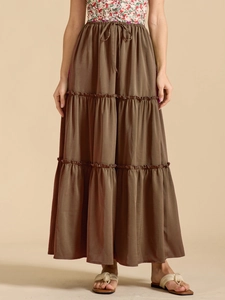 Close-up of high-waist tiered skirt with adjustable drawstring and elastic waistband