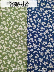 Detailed comparison of green and navy blue floral Korean silk fabric textures