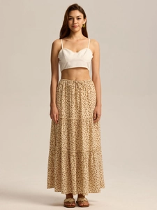 Detail of the high waist floral tiered maxi skirt with adjustable tie waist detail