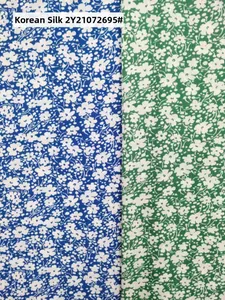 Detailed fabric texture of Korean silk floral print skort in blue and green colors