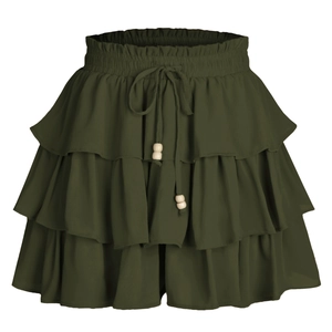 Detailed view of elastic ruffled waist and adjustable drawstring with wooden beads