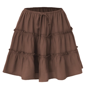 Detailed view of brown layered ruffle mini skirt with elastic waist and drawstring tie