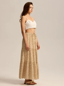 Close-up of high-waisted floral skirt with adjustable drawstring and tiered design