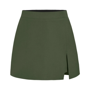 Detail view of high waist dark green skort featuring a side slit and premium woven texture