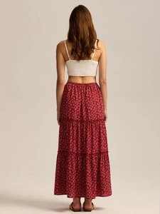 Back view of red high-waist floral tiered maxi skirt with elastic waist for women
