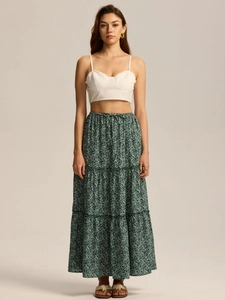Detail of high waist adjustable drawstring on green floral tiered maxi skirt