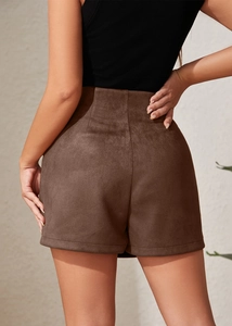 Rear view of brown high-waisted faux suede skort showing premium velvet texture