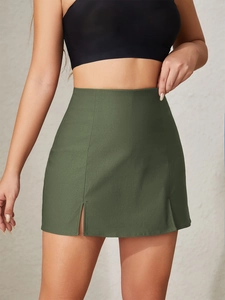 Detail view of dark green high waist mini skirt with stylish double side slits