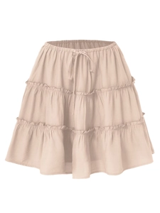 High-waisted apricot tiered mini skirt with elastic drawstring and layered ruffles
