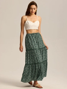 Detail of high waist floral tiered maxi skirt with adjustable drawstring and pockets