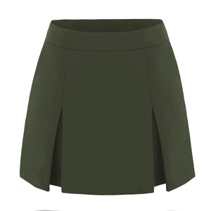 Close-up of high-waisted olive green mini skirt with symmetrical pleats and woven fabric