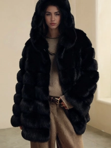 Faux fox fur hooded jacket in black with wide horizontal panels and fluffy texture