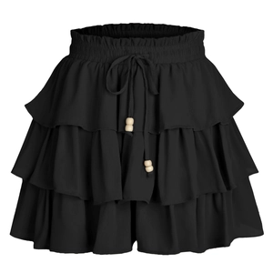 Detail of elastic smocked waist with drawstring and wooden beads on black tiered mini skirt
