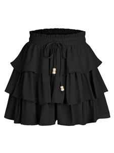 Women's black tiered ruffle mini skort with elastic drawstring waist and wood beads