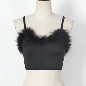 Close-up of black crop top featuring plush feather trim and thin spaghetti straps