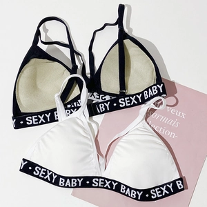 Detail of elastic band with Sexy Baby lettering on seamless triangle sports bra