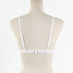 Detailed back view of white camisole bra featuring thin adjustable straps and clasp