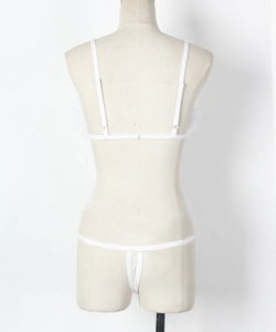 Detailed back view of white lace lingerie set with feather trim and adjustable straps