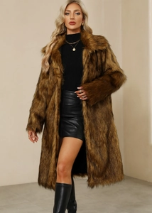 Detail of long dark brown faux fur coat showing soft texture and high-end finish