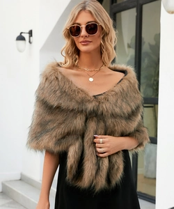 Close-up of brown faux fur shawl with soft texture and natural gradient pattern