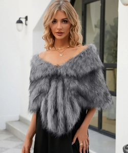 Detail of grey faux fur shawl showing plush texture and elegant wrap styling on shoulders