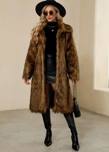 Detail of long brown faux fur coat with plush texture and elegant oversized lapel design