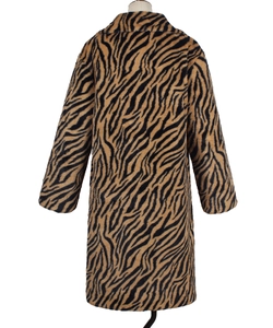 Back view of a long faux fur coat featuring bold tiger print and classic notch lapels