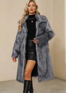 Detailed view of women's gray faux fur coat with long plush texture and square collar
