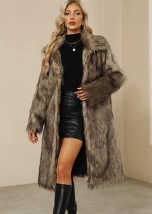 Detail view showing soft brown faux fur texture and collar of women's long coat