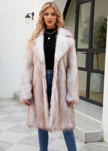 Detailed texture of white and tan striped faux fur coat with elegant wide lapels