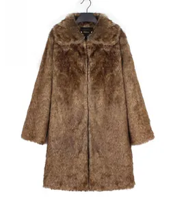 Detail view of brown faux fur coat with triple-tone gradient texture and large notch lapel