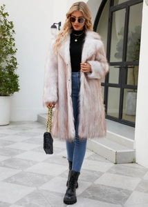 Detailed texture of white faux fox fur coat with reddish-brown tips and lapel collar