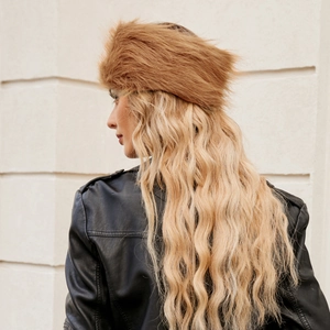 Close-up of soft brown faux fur headband showing fluffy texture and warm plush material